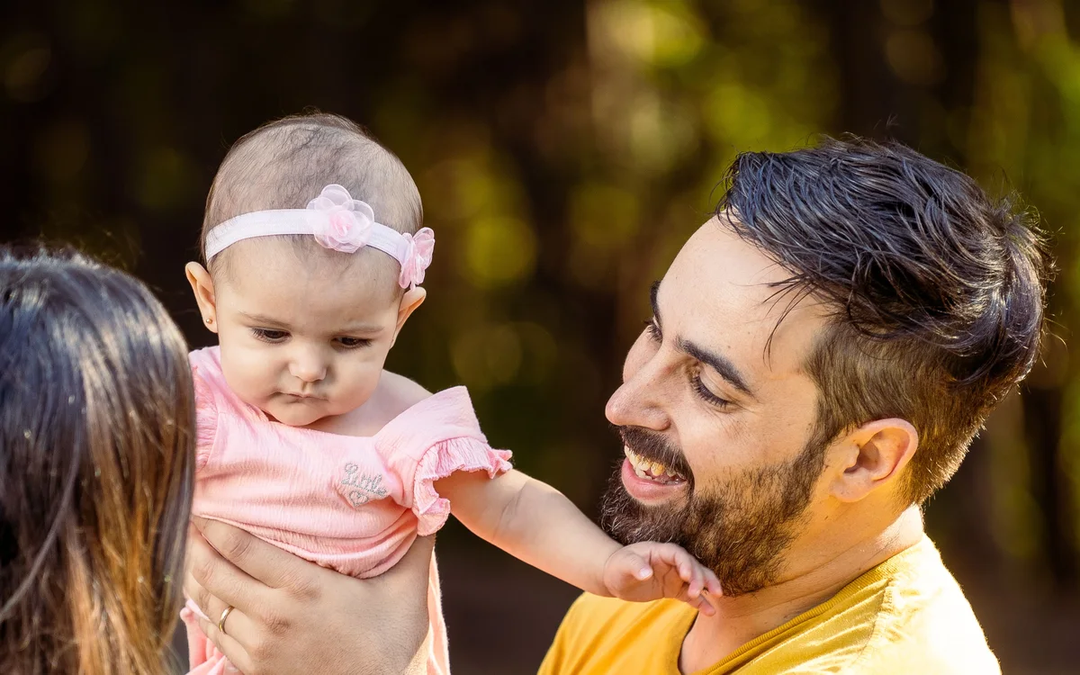 Representative stock photograph of a family with a baby; not a photograph of the child receiving support